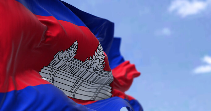 Detail of the national flag of Cambodia waving in the wind on a clear day. - Powered by Adobe