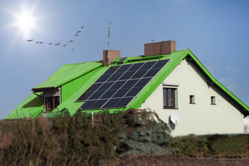 Photovoltaic panels on the green roof. Solar panel - green energy.