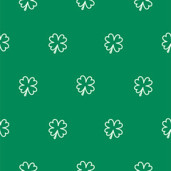 Shamrock leaf St. Patricks Day seamless pattern. Simple clover leaves on green background