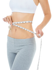 Taking off inches and feeling trim. Cropped studio shot of a woman measuring her waist with a measuring tape -Isolated image.