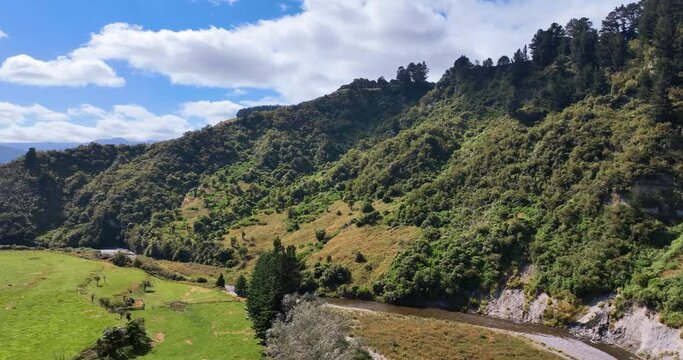 Aerial up the winding Oroua river towards the Ruahine mountain range - NZ
