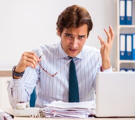 The businessman disgusted with cockroaches in the office