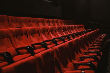 Red colored cinema seats with no people