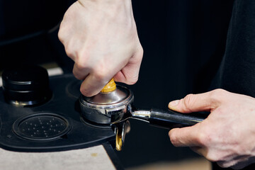 close up of a hand holding a key