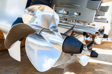 Motor propellers for motor yachts and boats close-up. The motors are mounted at the stern of the...