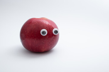 Funny red apples with eyes