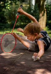 child playing tennis