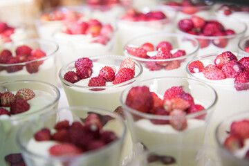 Cream with Strawberries in Glasses