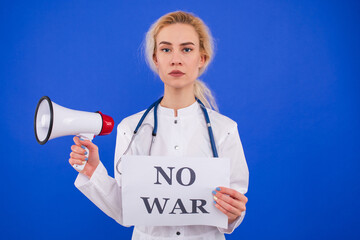 A female doctor holds a megaphone and poster saying no war