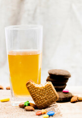 creamy cookies with orange juice isolated on background,