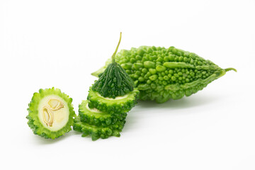 green Bitter melon or Bitter gourd slices isolated on white background, food concept