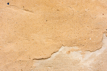 Texture of a concrete wall with cracks and scratches which can be used as a background