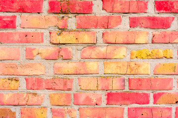 Obraz premium Brick wall with orange brick. Orange brick background