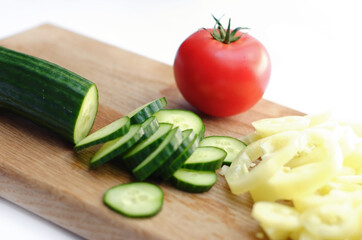 Sliced cucumber pepper and tomato
