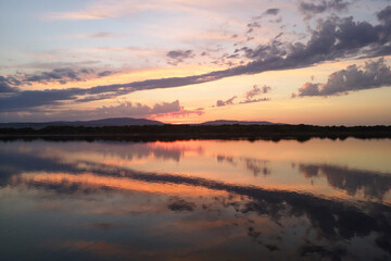Fototapeta premium Beautiful sunset taken in Port Leucate South of France with sky reflection in a Mediterranean landscape