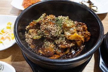 Stir-fried spicy pork with red pepper paste. It's a Korean dish. It's called Jeyukbokkeum