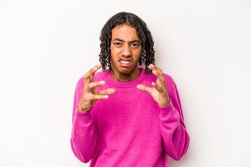 Young African American man isolated on white background upset screaming with tense hands.