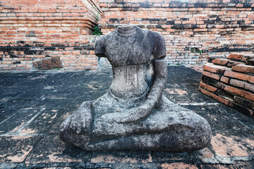 Wat Mahathat is an ancient site in Ayutthaya, Thailand that tourists like to visit and photograph,...