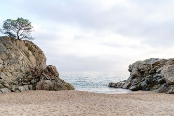 Sea amidst rock formations on beach