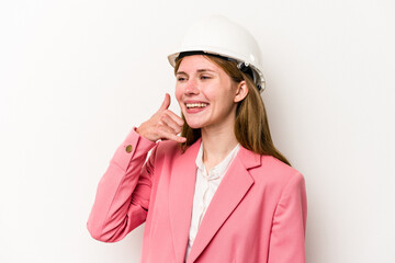 Young architect English woman with helmet isolated on white background showing a mobile phone call gesture with fingers.
