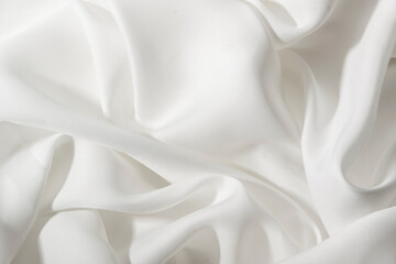 Wrinkled silky luxurous textile. Smoothy satin drapery
