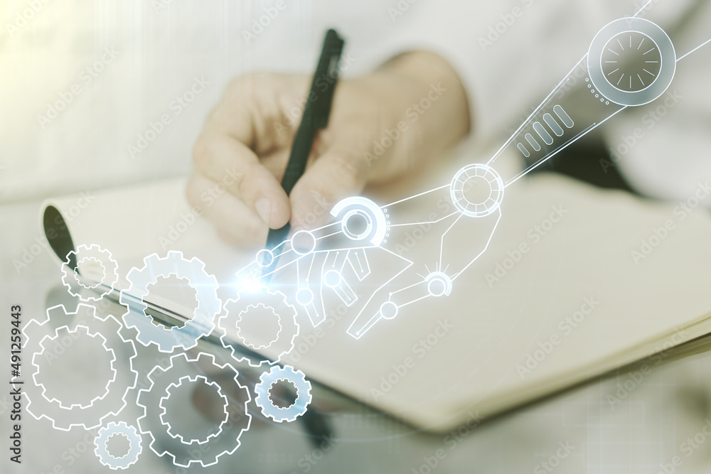 Aufkleber creative concept of robotics technology and man hand writing in notebook on background. robot develo