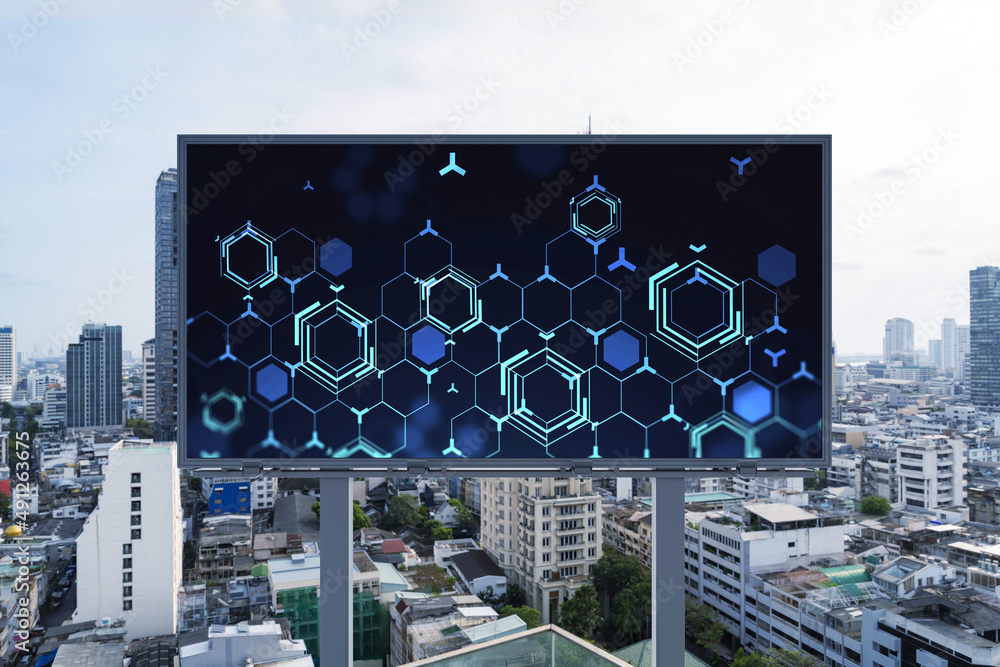 Poster technology hologram on billboard over panorama city view of bangkok. the largest tech hub in southea
