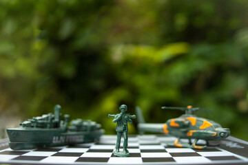Obraz premium military chess on a chessboard. business ideas and competition and strategy Ukraine and Russia for political conflict and war concept