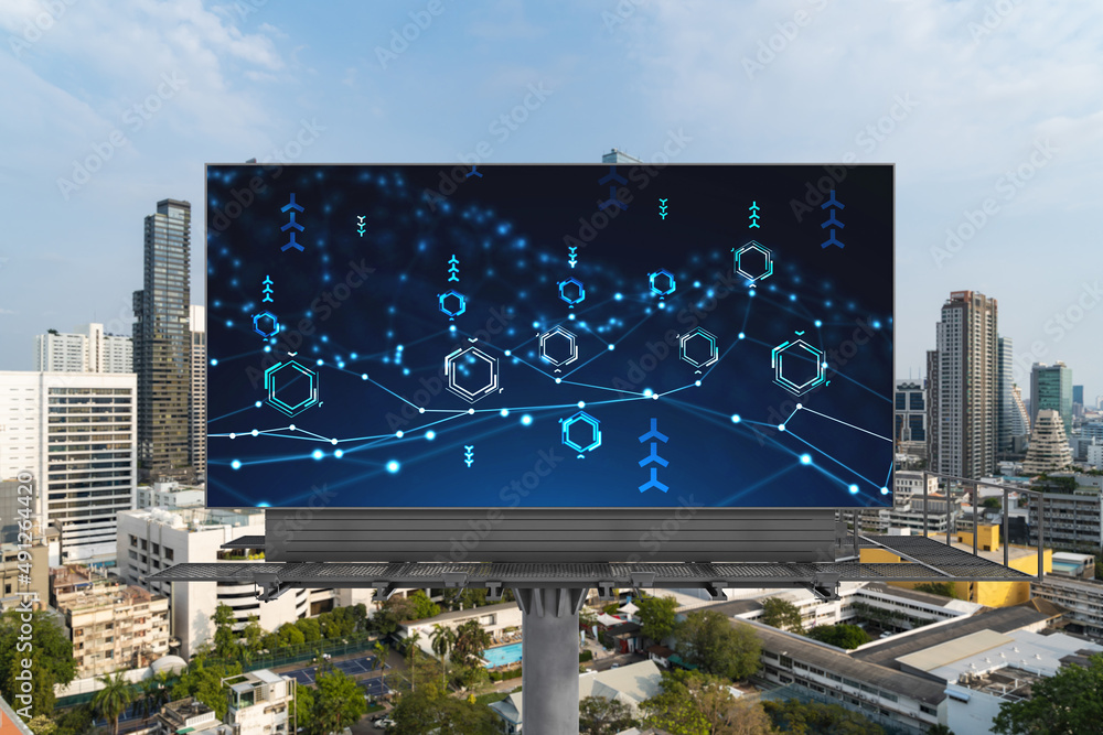 Poster technology hologram on billboard over panorama city view of bangkok. the largest tech hub in southea