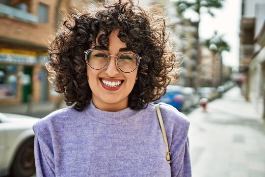 Young Middle East Woman Smiling Confident Wearing Glasses At Street