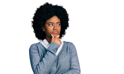 Fototapeta na wymiar Young african american woman wearing business clothes with hand on chin thinking about question, pensive expression. smiling with thoughtful face. doubt concept.