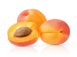 Heap of ripe apricots isolated on white background with clipping path. Close up