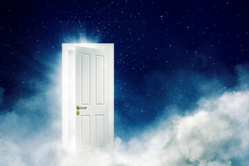 Bright open door on the clouds