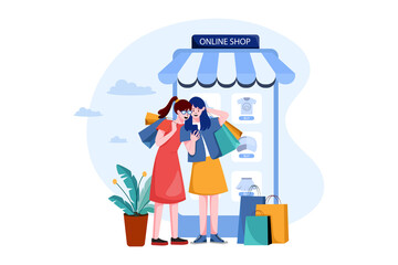 Two happy women go shopping online 