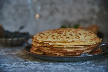 Pancake week. Delicious Pancakes with black caviar.