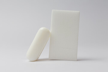 soap and melamine sponge for cleaning, white background, mockup