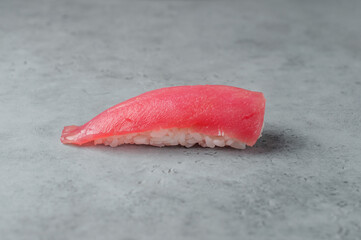 sushi with tuna on gray background 