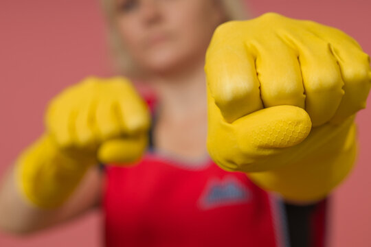 close-up woman cleaning lady in protective gloves boxing
