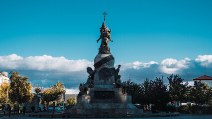 Christopher Columbus statue over blue sky
