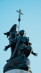 Christopher Columbus statue over blue sky

