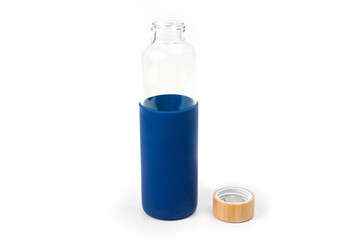 Stylish glass water bottle with wooden lid. For fitness and travel.