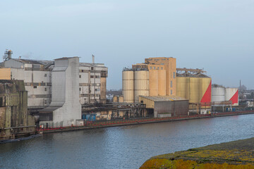 Grain silo and industrial building on the quay of a port in Saint Nazaire, France