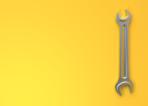 Wrench on a yellow background. Top view with copy space. Minimal creative concept. 3d render illustration