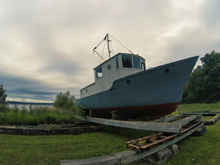 An old boat in dry dock.