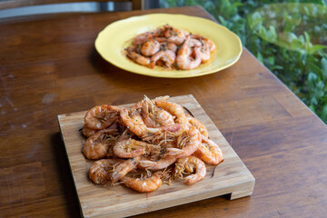shrimp - tasty fried pink prawns served on a plate