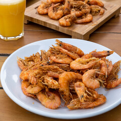 shrimp - tasty fried pink prawns served on a plate