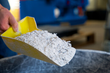 Close up of granulated plastic waste on a recycling plant for plastics