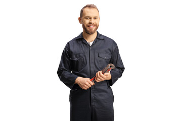 Plumber in a uniform holding pliers