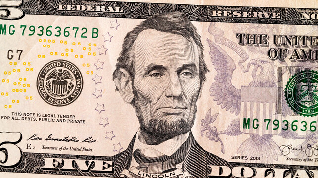 Five dollars note. President Lincoln portrait closeup. US money concept. High quality photo