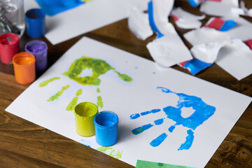 Prints of children's hands, painted in the colors of the Ukrainian flag, yellow and blue. National...